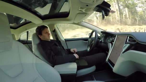 Tesla Autonomous Car March 2017 Businessman Sleeping Self Driving Steering — Stock Video