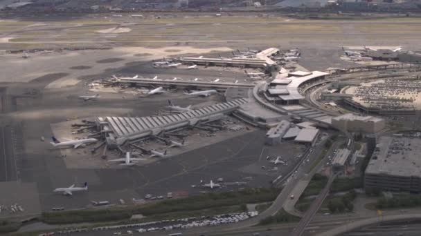 Aerial Close Flying Airplanes Parked Apron Waiting Passengers Board Jetway — Stock Video