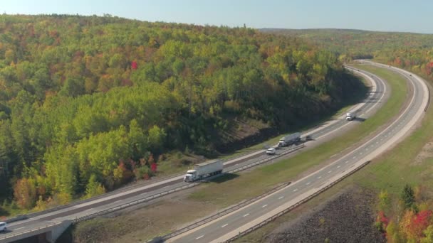 Aerial Flying Full Traffic Multiple Lane Highway Curving Mountainous Landscape — Stock Video