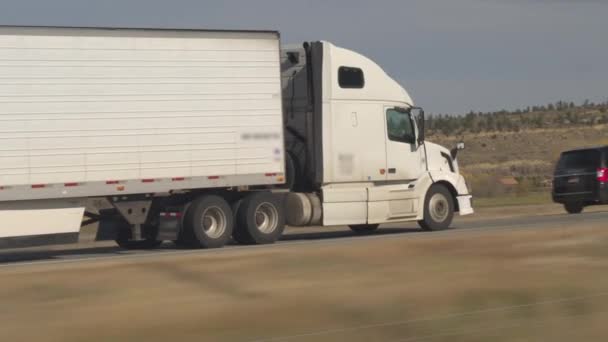 Aerial Close Container Semi Truck Transporting Goods Driving Interstate Highway — Stock Video