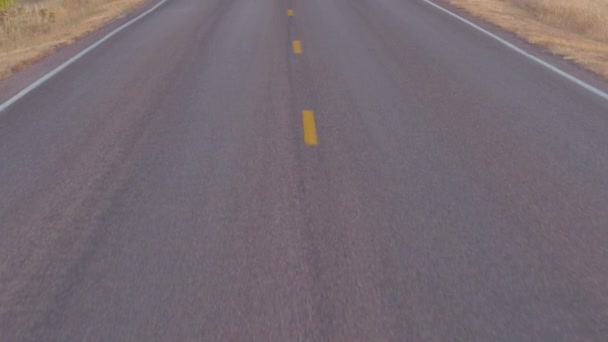 Aerial Flying Empty Road Leading Dry Grasslands Prairie Amazing Badlands — Stock Video