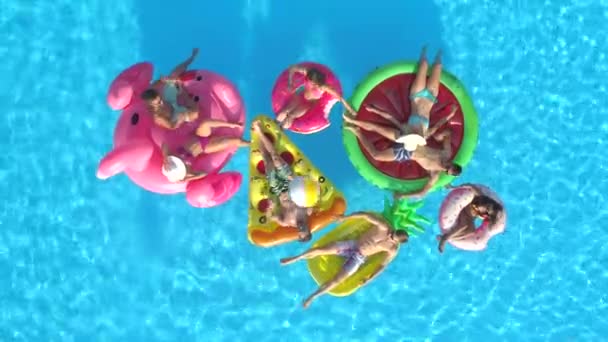 Aerial Top Cheerful Girls Guys Playing Ball Colourful Floaties Pool — Stock Video