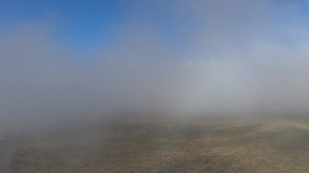 Aerial Flying Trough Fog Clouds Revealing Stunning Grand Teton Mountain — Stock Video