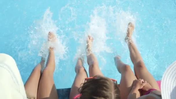 Slow Motion Close Three Unrecognizable Cheerful Girls Sitting Pool Edge — Stock Video