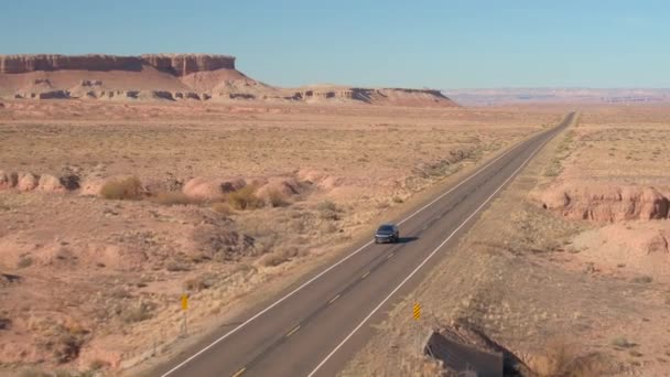 Aerial Distancing Flying Black Suv Car Driving Empty Road Trough — Stock Video