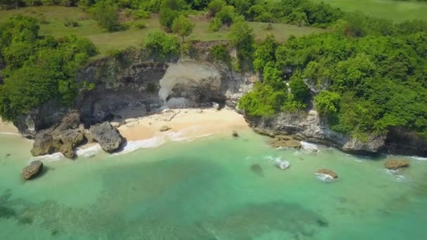 Aerial Close Stunning Pristine White Sandy Beach Rough Rocky Cliff — Stock Video
