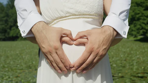 Close Unrecognizable Couple Makes Heart Shape Woman Pregnant Belly Hands — Stockfoto