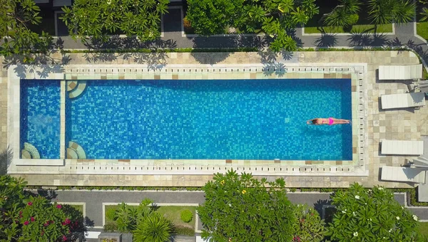 Aerial Top Unrecognizable Female Tourist Pink Bikini Dives Epic Pool — Stock Photo, Image