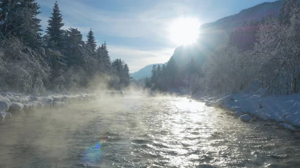 Aerial Lens Flare Mist Rolling Mountain Stream Flowing Beautiful Snowy — Stock Photo, Image