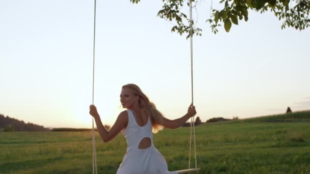 Slow Motion Close Joyous Girl Swinging Warm Pleasant Summer Evening — Stockvideo