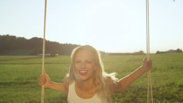 Slow Motion Close Blonde Girl Radiating Joy Swinging Sunny Nature — Stock Video