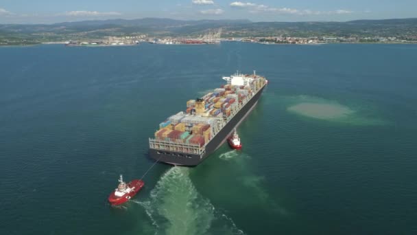 Aerial Flying Container Ship Approaching Shipyard Distant Coast Freight Ship — Stock Video