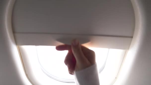 Close Woman Traveler Pulls Blinds Looks Airplane Window Her Long — Stock Video