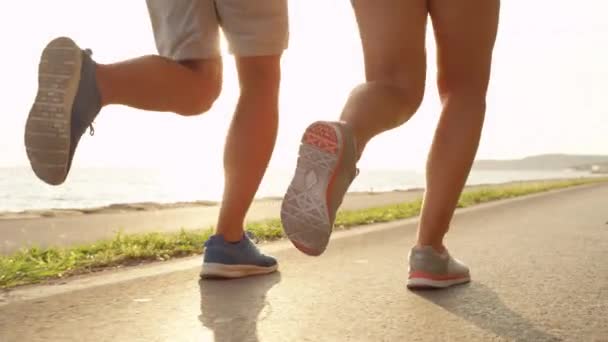 Young Boyfriend Girlfriend Jogging Together Sunny Seaside Active Man Woman — Stock Video