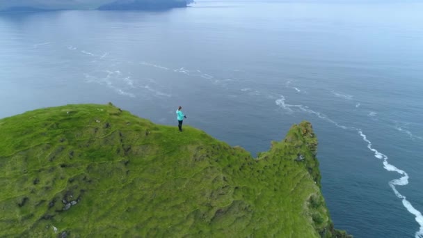 Aerial Flying Unrecognizable Woman Taking Photos Rugged Scandinavian Seaside Grassy — Stock Video