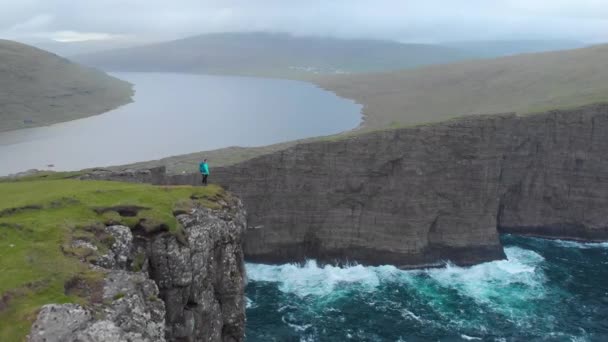 Aerial Copy Space Unknown Female Trekker Standing Edge Towering Cliff — Stock Video