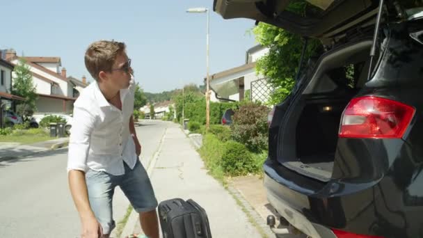 Close Excited Young Man Throws His Luggage Back His Big — Stock Video