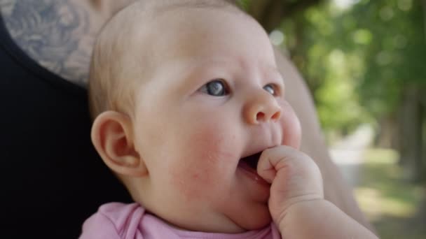 Slow Motion Close Cute Baby Girl Puts Her Tiny Hand — Stock Video