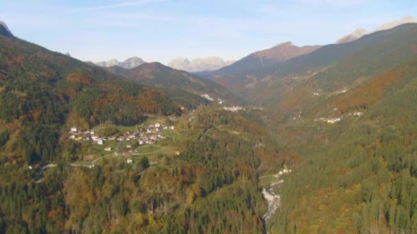 AERIAL: Flying over a beautiful valley in the Dolomites on a sunny fall day — Stock Video