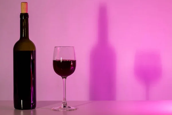 A bottle of wine and a glass — Stock Photo, Image