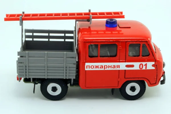 fire truck with a ladder of red color toy scale model 1:43 USSR Translation: \