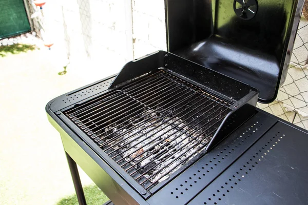 Open up metallic black barbecue