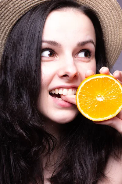 portakal, şapka ile güzel genç kız