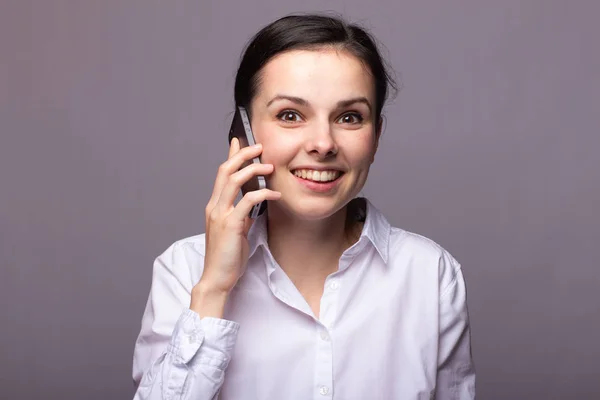 Girl White Shirt Communicates Phone — Stock Photo, Image