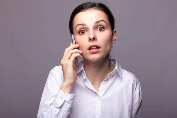 Girl White Shirt Communicates Phone — Stock Photo, Image