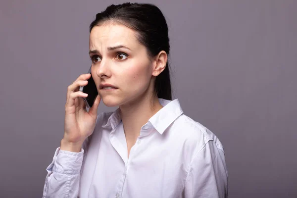 Girl White Shirt Communicates Phone — Stock Photo, Image