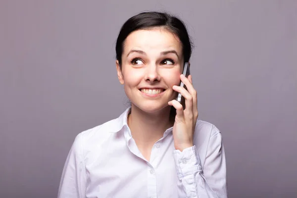 Girl White Shirt Communicates Phone — Stock Photo, Image