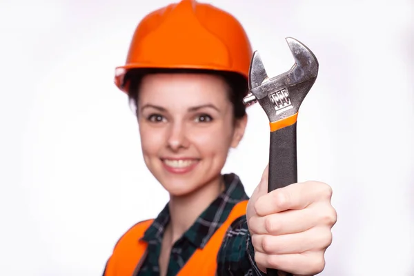 Beautiful Young Girl Worker Helmet Holds Her Hand Wrench — Stock Photo, Image