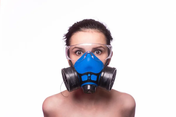 beautiful young girl in a respiratory mask