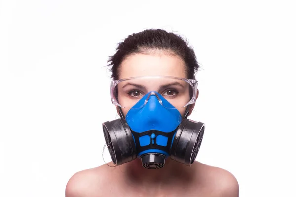 beautiful young girl in a respiratory mask