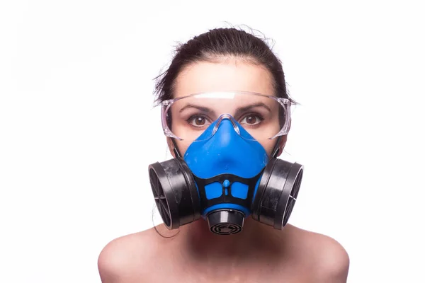 beautiful young girl in a respiratory mask