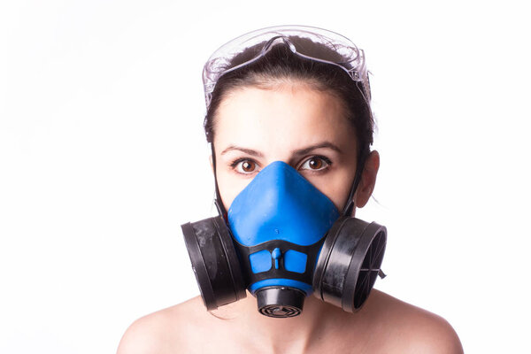 beautiful young girl in a respiratory mask