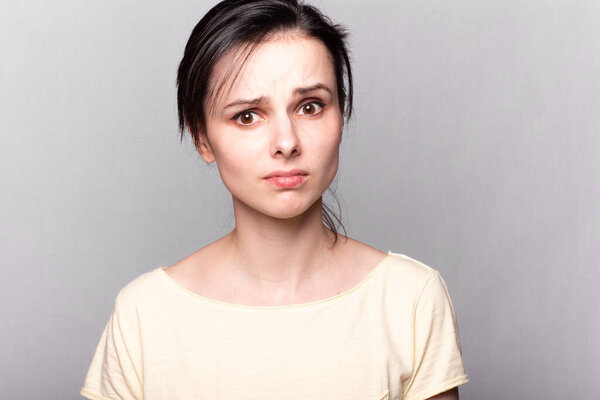attractive woman in a yellow t-shirt