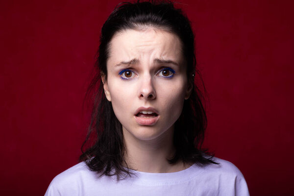 beautiful woman going through, red background