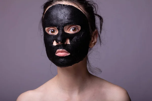 Mujer Máscara Tela Negra Cara Cuidado Cosmético Piel —  Fotos de Stock