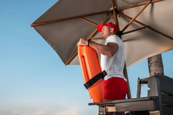 Lifeguards in great physical shape on the private beach — Stock Photo, Image