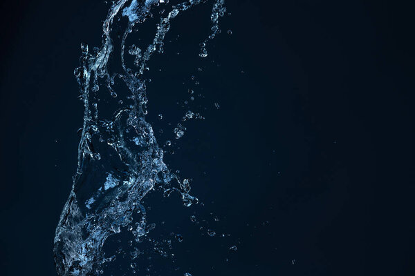 Water Splash On The dark blue background.