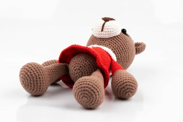 Funny handmade knitted toy bear