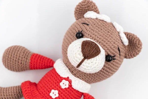 Funny handmade knitted toy bear