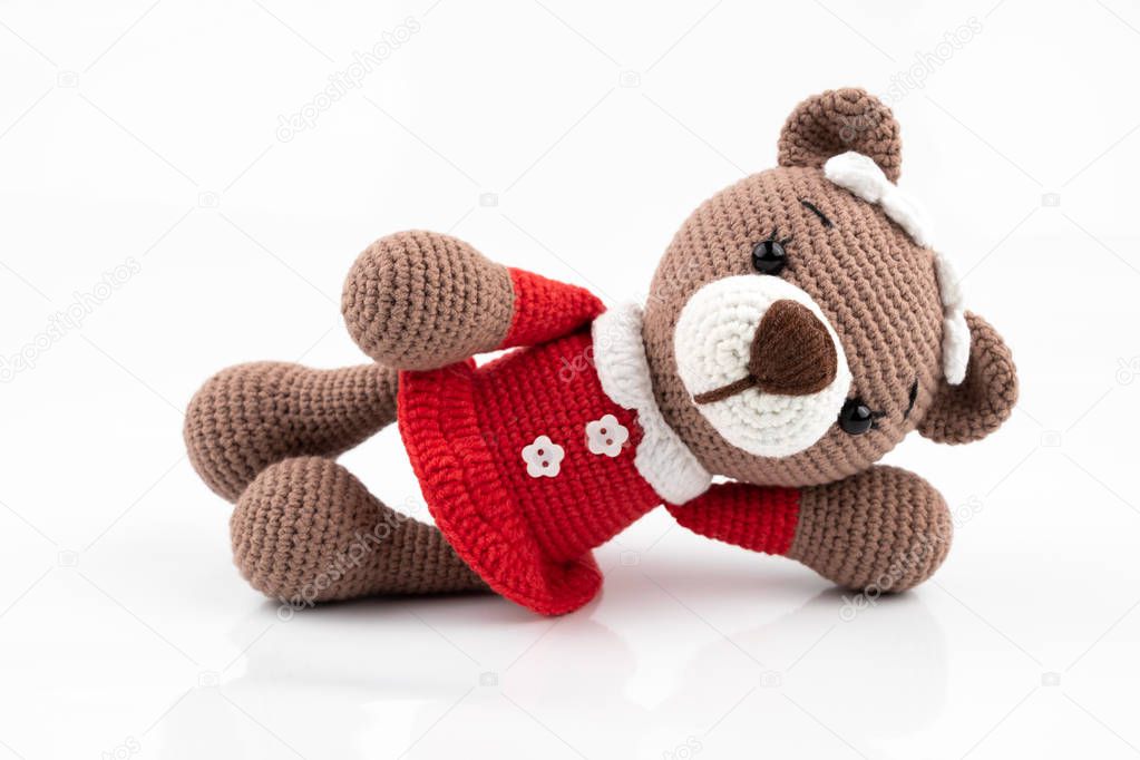 Funny handmade knitted toy bear