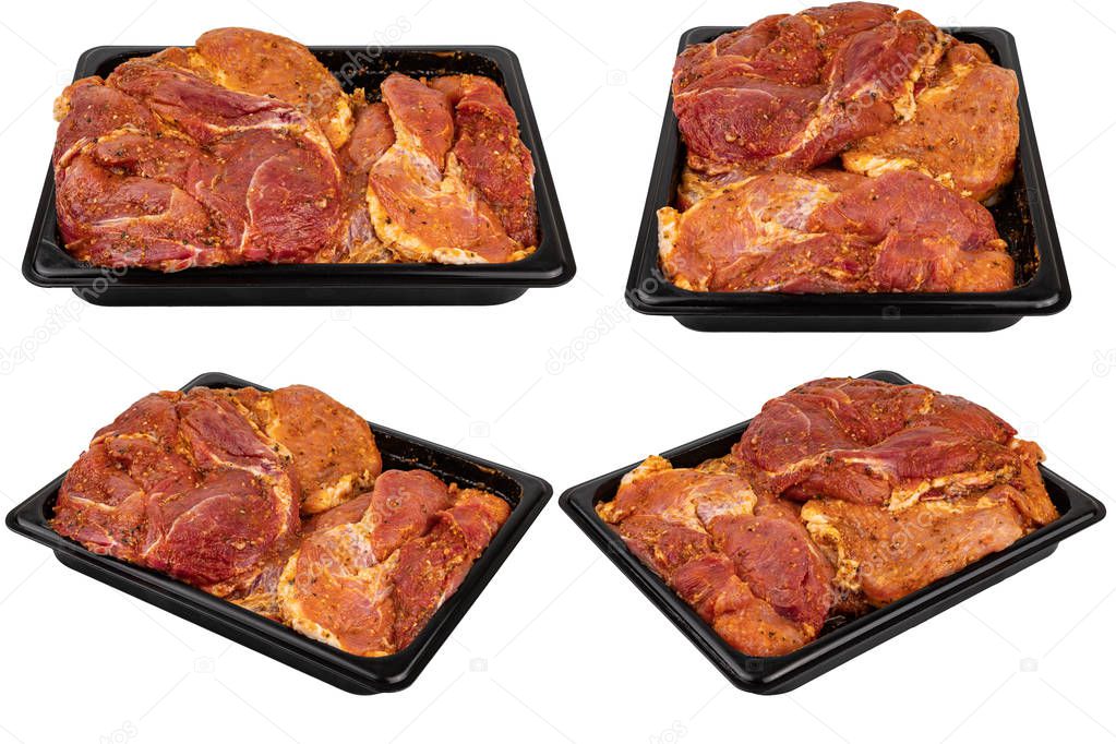 Marinated meat in a black plastic container on a white isolated background. Ready for sale. 