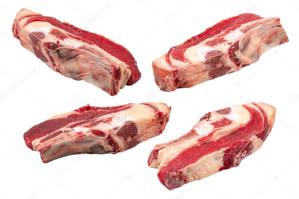 Pieces of raw meat on a white isolated background