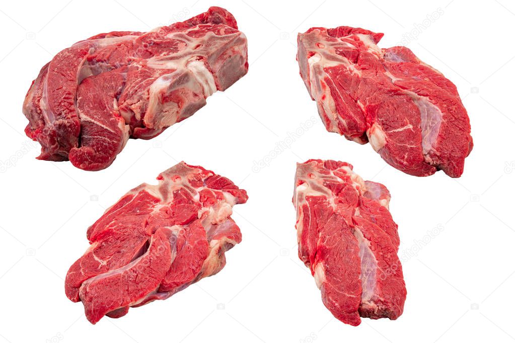 Pieces of raw meat on a white isolated background