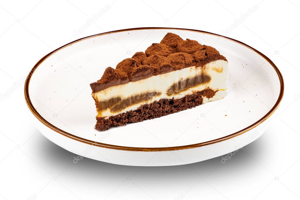 Dessert. Piece of cake on light plate close up on white isolated background