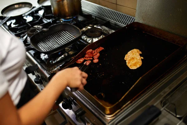 Meat On The Grill In The Restaurant Kitchen