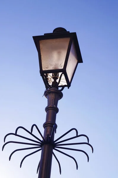 Typical street lamp in a street of Salerno, Italy
